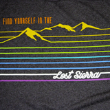 Close up of Mountain design in rainbow colors on dark fabric. Text reads, "Find Yourself in the Lost Sierra"